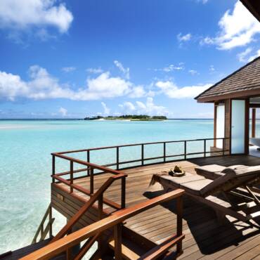 Anantara_Dhigu_Maldives_Resort_Guest_Room_Over_Water_Suite_Deck_with_Sunbeds