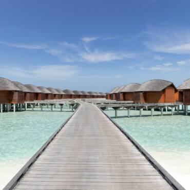 Anantara_Dhigu_Maldives_Resort_Guest_Room_Walkway_to_the_Over_Water_Suites