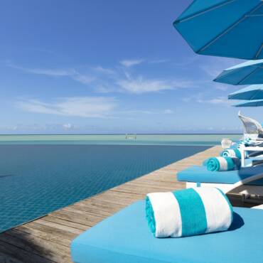 Anantara_Dhigu_Maldives_Resort_Pool_View_Aqua_Pool_Deck