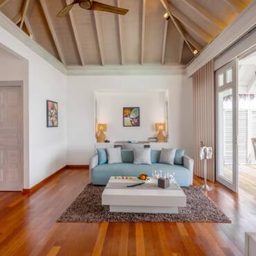 NH_Maldives_Kuda_Rah_Resort_Over_Water_Suite_with_Private_Pool_Living_Room