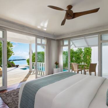 NH_Maldives_Kuda_Rah_Resort_Two_Bedroom_Duplex_Beach_Villa_with_Private_Pool_Bedroom_Looking_Out