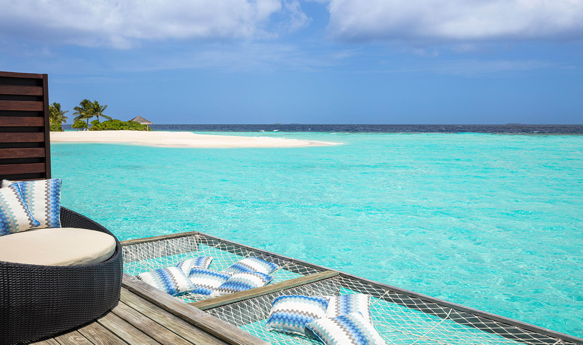 nh_collection_maldives_havodda_resort_10_over_water_villa_hammock_1920x1137