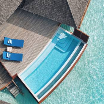 12-anantaradhigumaldivesresortguestroomoverwaterpoolsuiteoutdoordeckaerial1920x1037